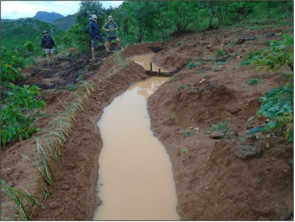 The use of contour berms to combat erosion on slopes.